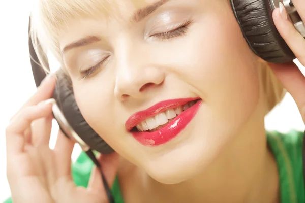 Beautiful woman listen to the music — Stock Photo, Image
