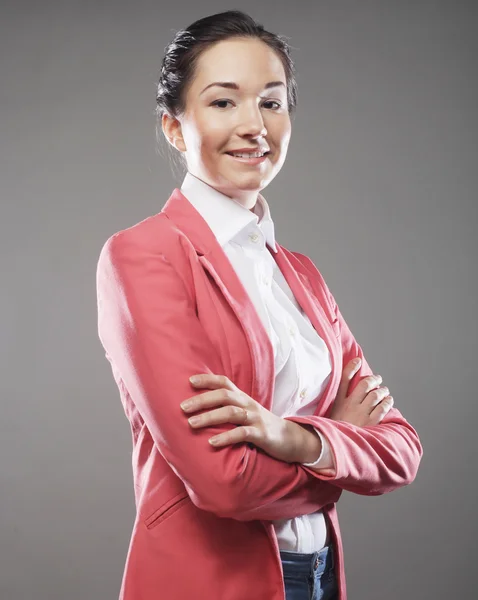 Mujer de negocios sobre fondo gris — Foto de Stock