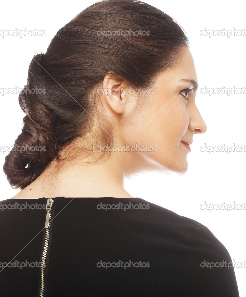 Eautiful female face in profile with makeup and hairstyle