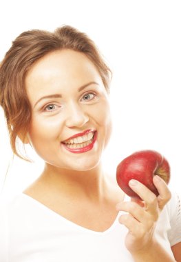 elinde kırmızı bir elma ile genç kız