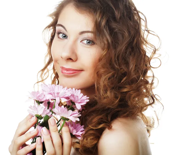 Blondýnka dívka s růžovou květinou na bílém pozadí — Stock fotografie