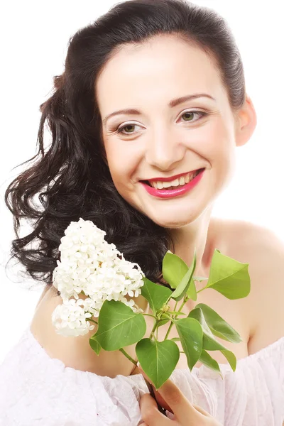 Donna con fiori bianchi — Foto Stock