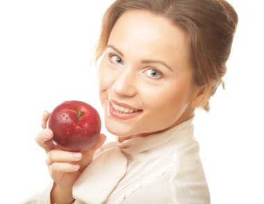 elinde kırmızı bir elma ile genç kız