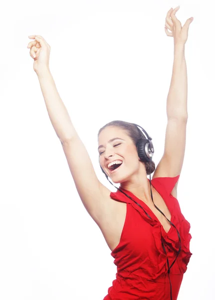 Woman dancing to music with headphones — Stock Photo, Image