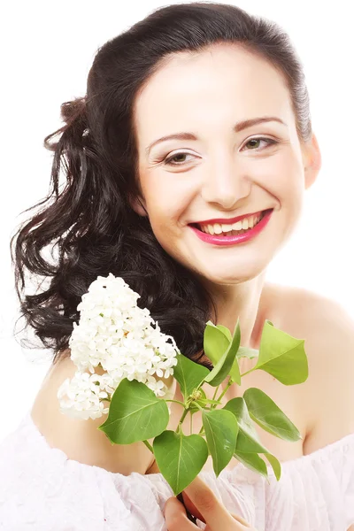 Donna con fiori bianchi — Foto Stock