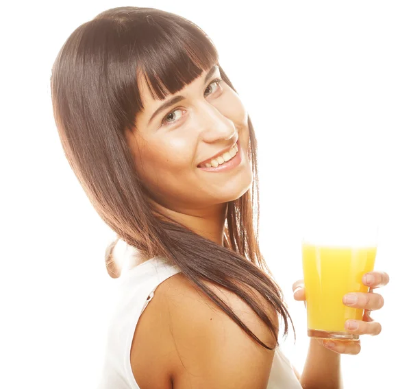 Woman isolated shot drinking orange juice — Stock Photo, Image