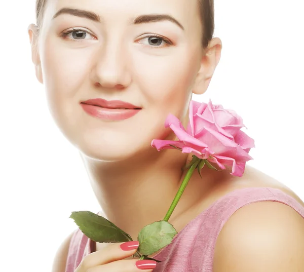 Vrouw met roze roos — Stockfoto