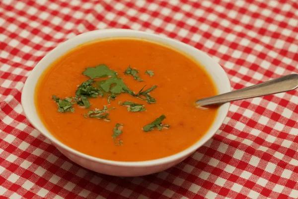 Closeup of a bowl with pumpkin soup — Stock Photo, Image