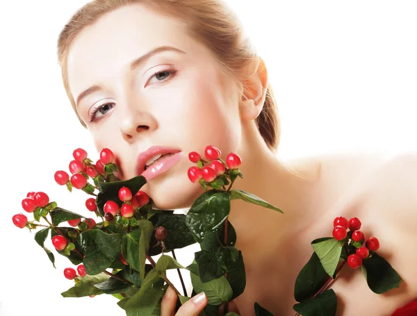 Woman holding Hypericum flowers — Stock Photo, Image