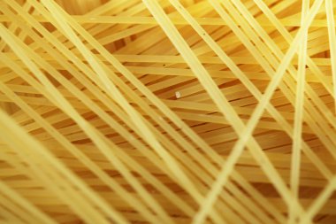 Yemek teması: arka plan olarak çiğ makarna