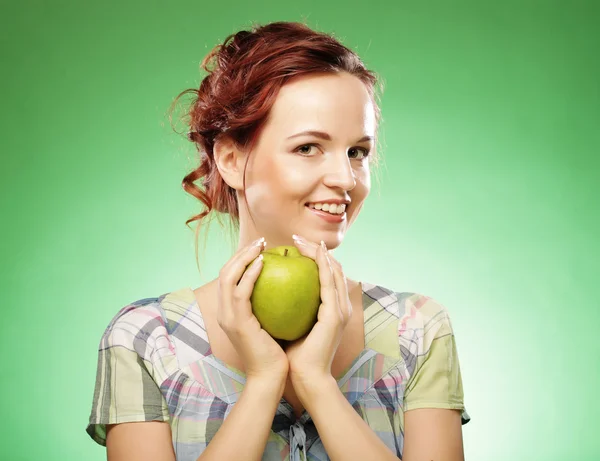 Mujer con manzana verde — Foto de Stock