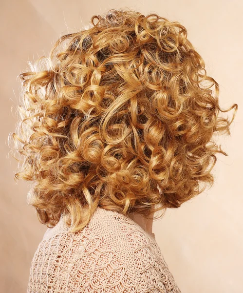 Beautiful female curly blond hairs - back view — Stock Photo, Image