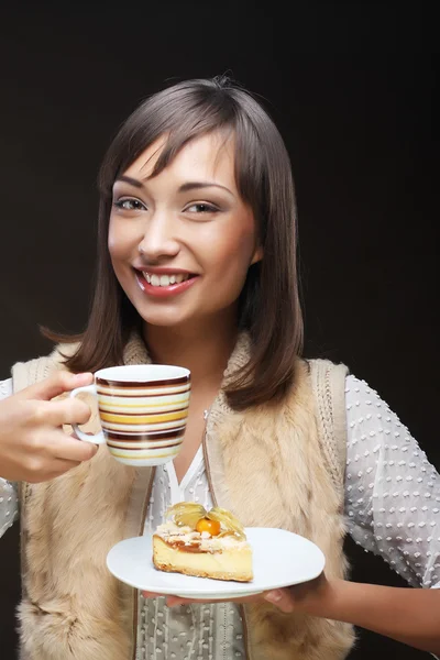 Attractive woman with coffee and dessert — Stock Photo, Image