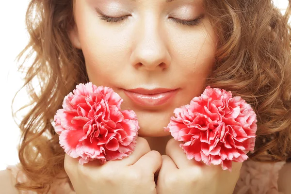 Blond girl with pink flower on white background — Stock Photo, Image