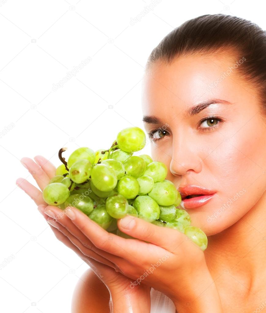 Woman with green grape Stock Photo by ©juice_team 29243375