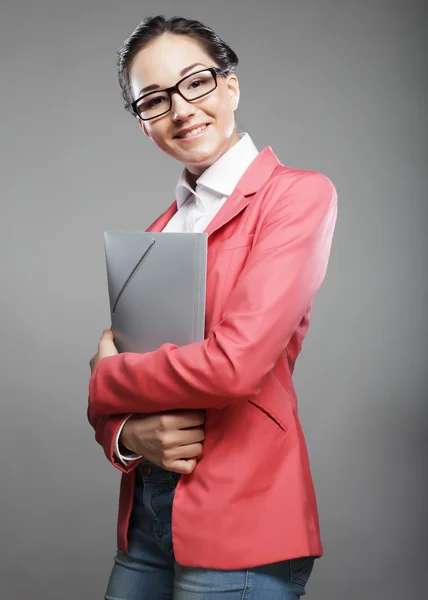 Young business woman with folders — Stockfoto