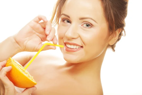 Beautiful woman drinking juice with straw — Stock Photo, Image