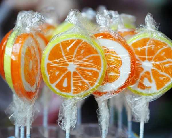 Orange lollipops — Stock Photo, Image