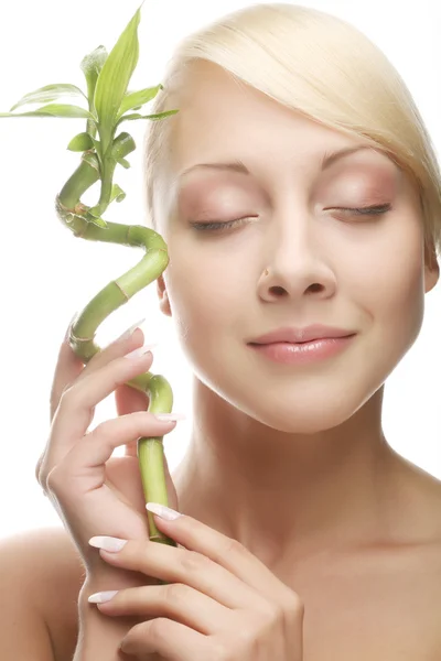 Beautiful woman with bamboo — Stock Photo, Image