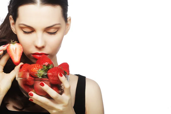 Sexy lady holding a juicy strawberry — Stock Photo, Image