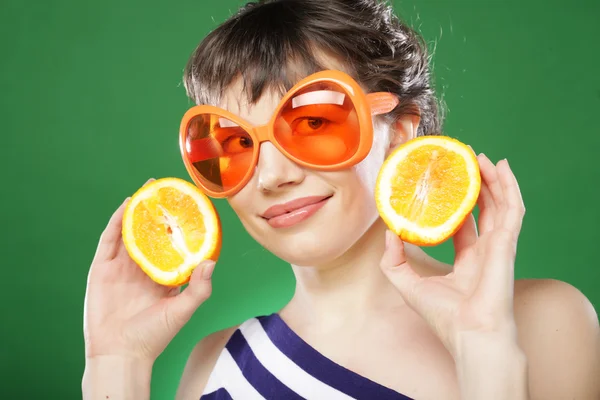 Woman with oranges — Stock Photo, Image