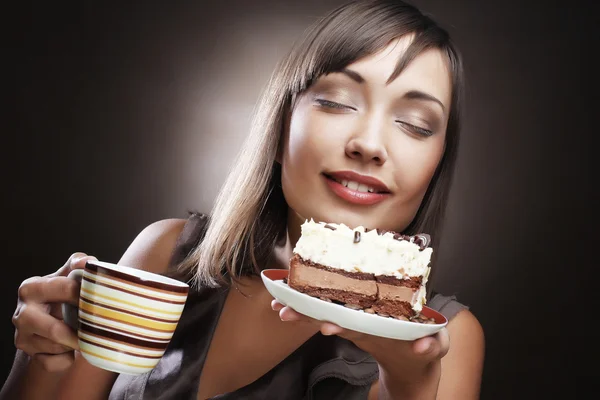 Vrouw met koffie en dessert — Stockfoto