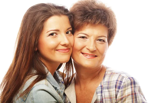 Stående mor och vuxen dotter — Stockfoto