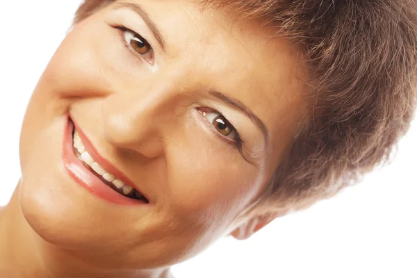 Close-up of a mature woman smiling — Stock Photo, Image