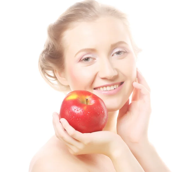 Blonde Frau mit einem Apfel — Stockfoto