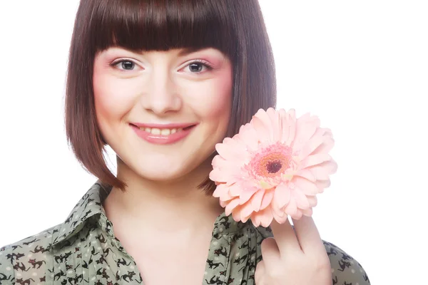 Vrouw met gerber bloem — Stockfoto