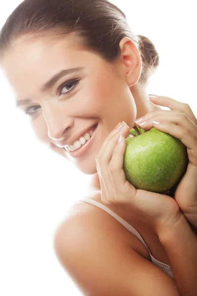 Ung glad smilende kvinde med grønt æble - Stock-foto