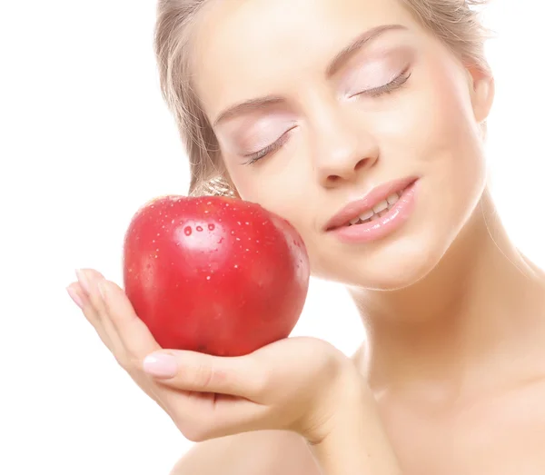 Blond kvinna med ett äpple — Stockfoto