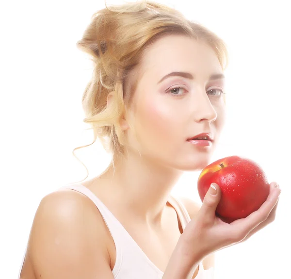 Blonde Frau mit einem Apfel — Stockfoto