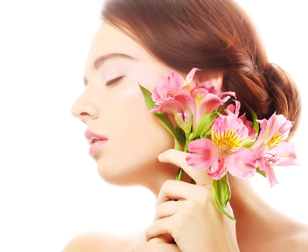 Beautiful woman with pink flowers — Stock Photo, Image
