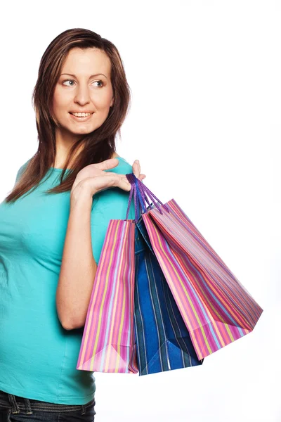 Žena šťastná, drží nákupní tašky. — Stock fotografie