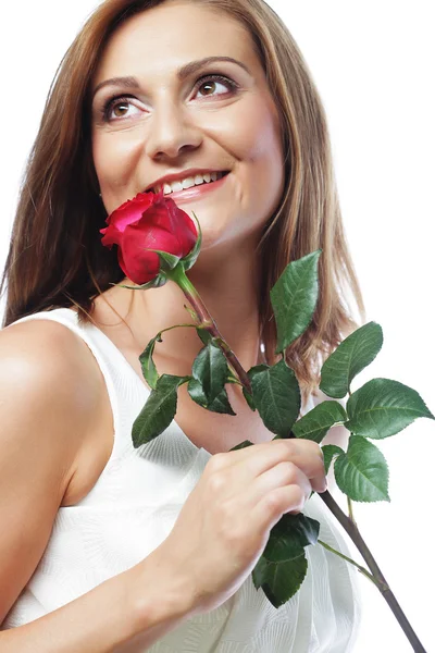 Piękna kobieta z czerwoną różą — Zdjęcie stockowe