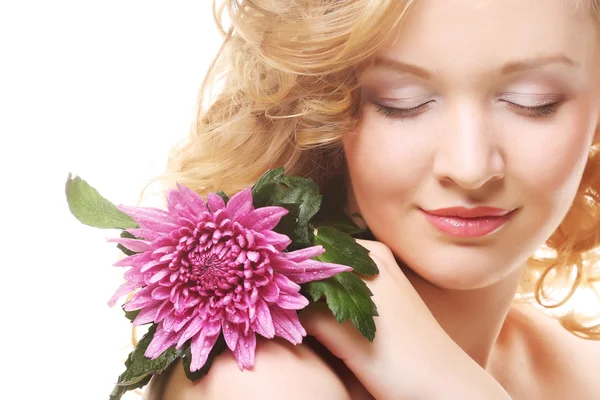 Woman with pink flower — Stock Photo, Image