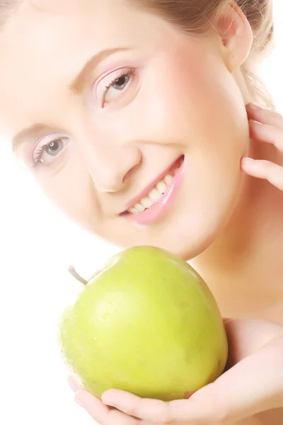 Mulher segurando maçã verde — Fotografia de Stock