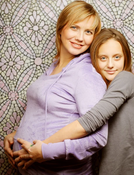 Pregnant woman with daughter — Stock Photo, Image