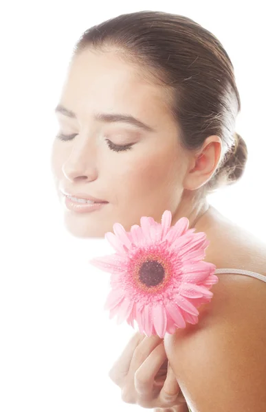 Jovem mulher bonita com flor rosa — Fotografia de Stock