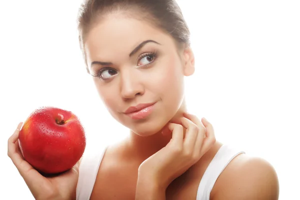 Attraktive junge Frau mit einem Apfel — Stockfoto