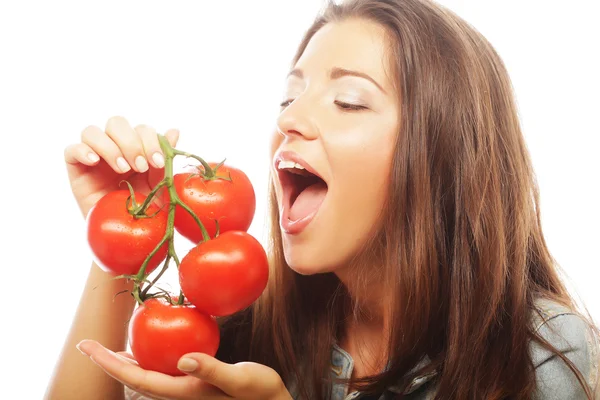 Mulher bonita com tomates maduros — Fotografia de Stock