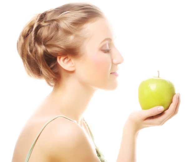 Zöld almát tartó nő — Stock Fotó