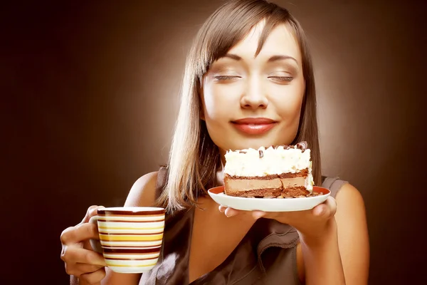 Femme avec café et dessert — Photo