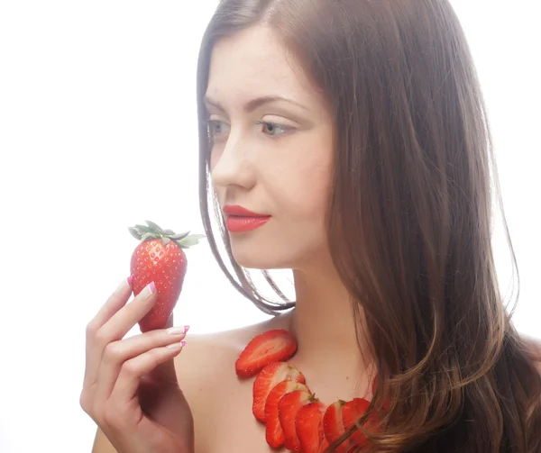 Sexy lady holding a juicy strawberry — Stock Photo, Image