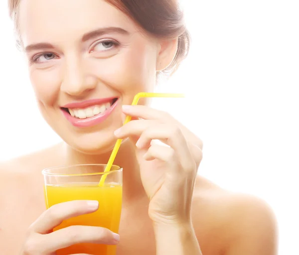 Mujer joven con jugo de naranja — Foto de Stock