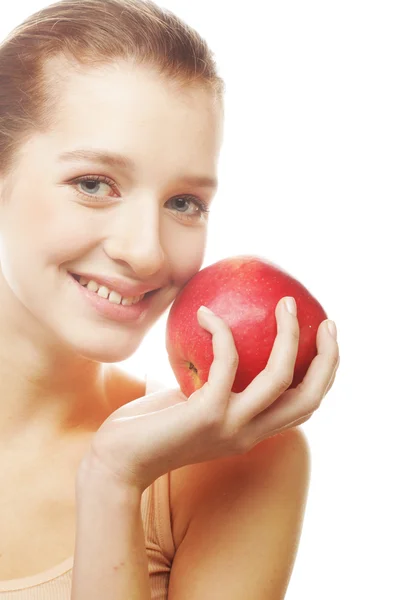 Atractiva joven con una manzana — Foto de Stock