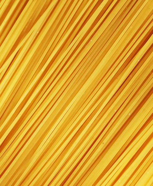 Сырая паста в целом фоне — стоковое фото