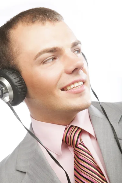 Business man enjoying pleasant music — Stock Photo, Image