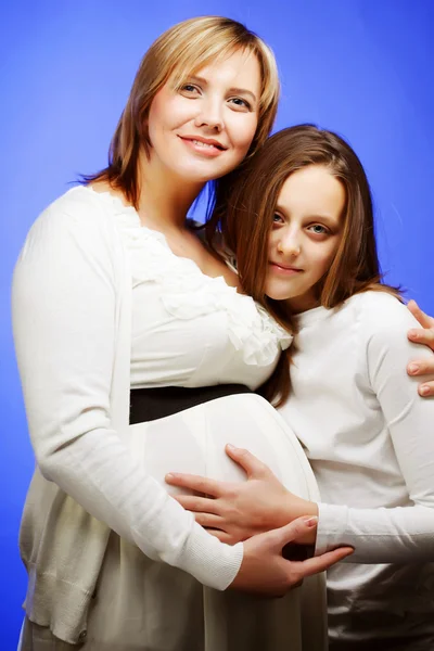 Pregnant woman with daughter — Stock Photo, Image